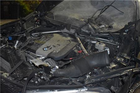 Der BMW des Opfers hatte nach der Explosion nur noch Schrottwert.